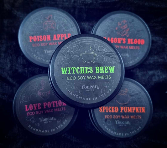 Photo of five tins of wax melts. Five varieties: poison apple, witches brew, dragon's blood, love potion and spiced pumpkin