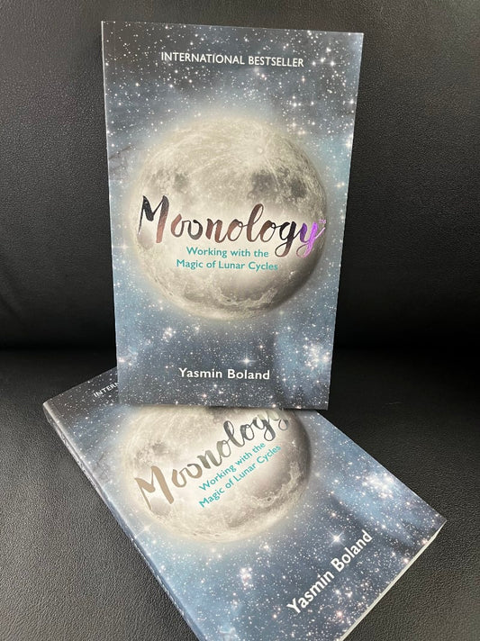 Photos of two copies of the book Moonology: Working with the Magic of Lunar Cycles