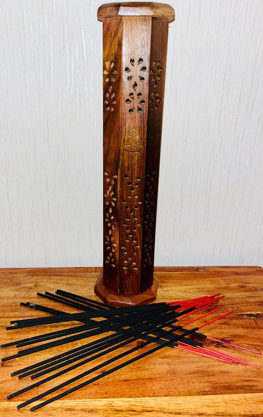 Photo of a vertical wooden multiple incense holder with a gold Buddha emblem.