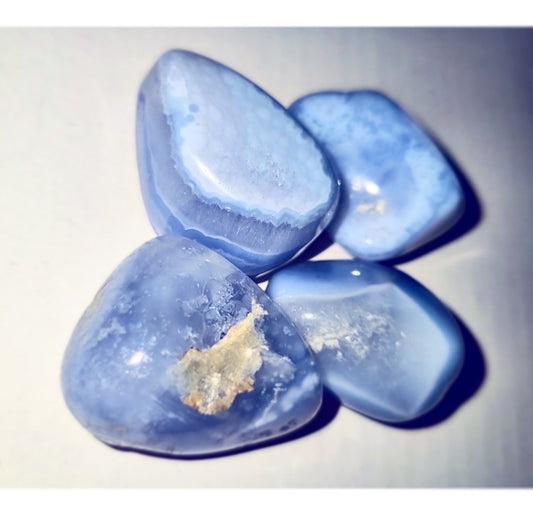 Photo of four agate lace blue stones