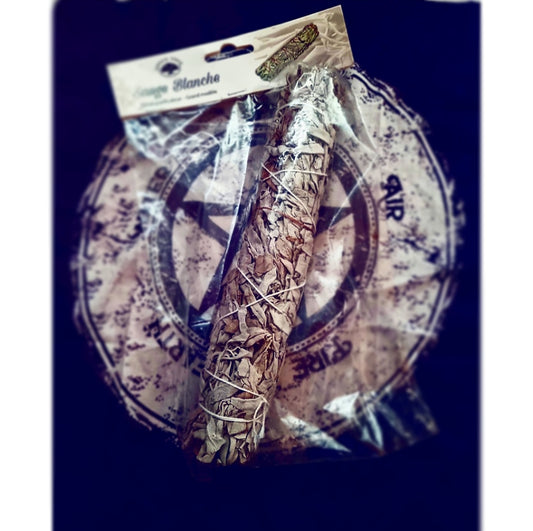 Photo of a large sage smudge stick in a clear plastic wrapper