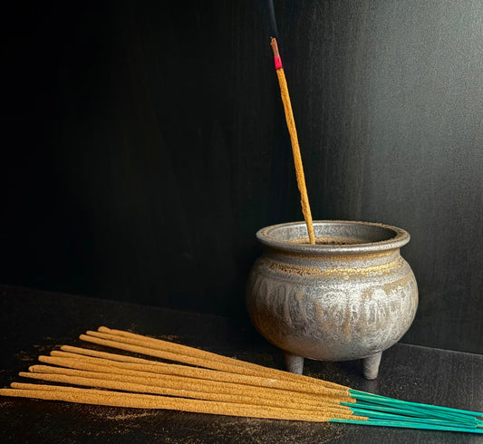 Ceramic cauldron incense burner.