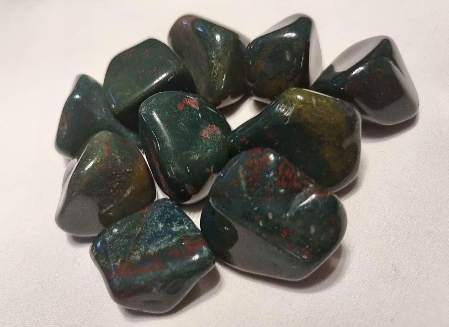 Photo of several bloodstone tumblestones