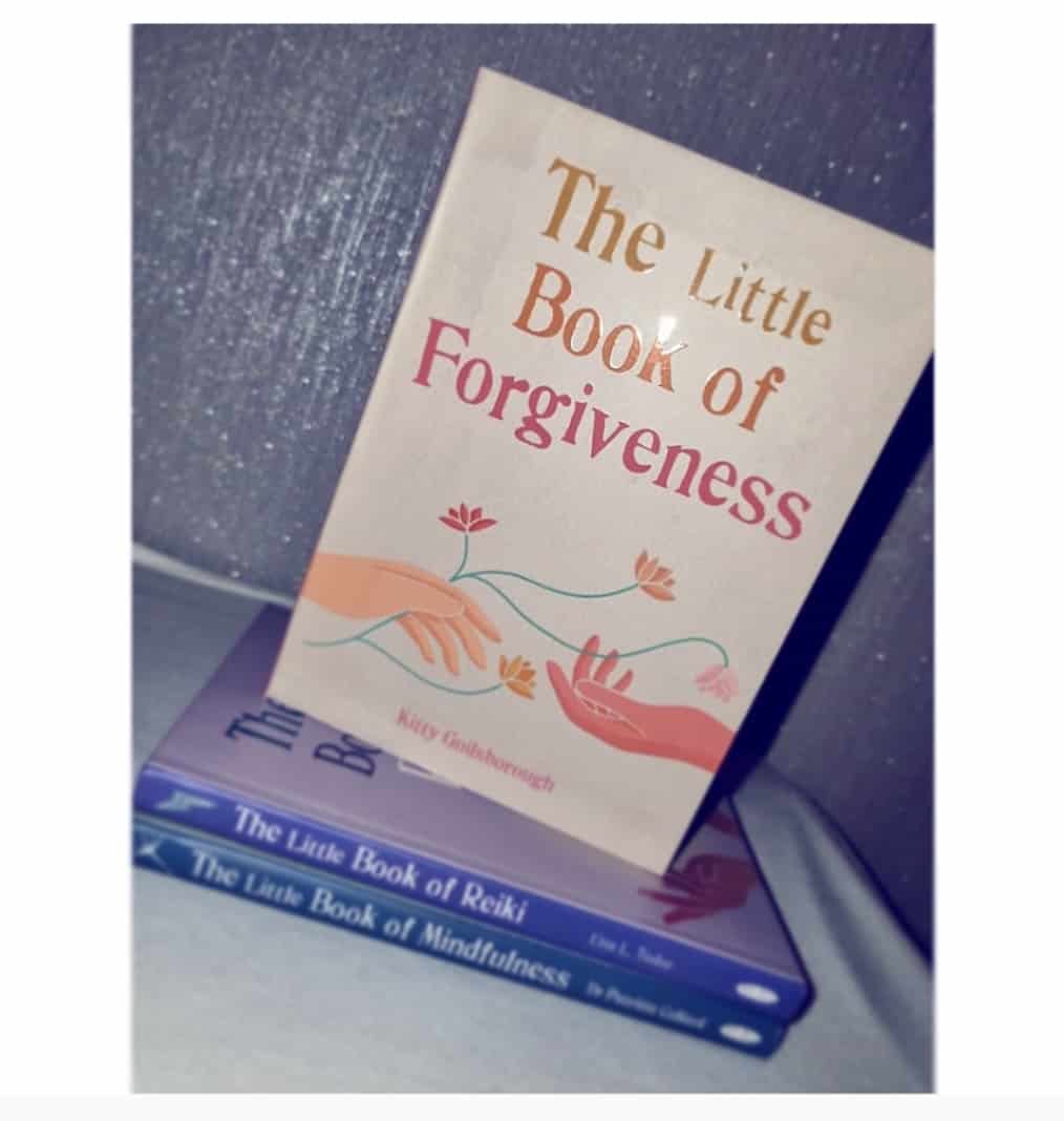 Photo of three Little Book of.. books with the full cover shown of The Little Book of Forgiveness