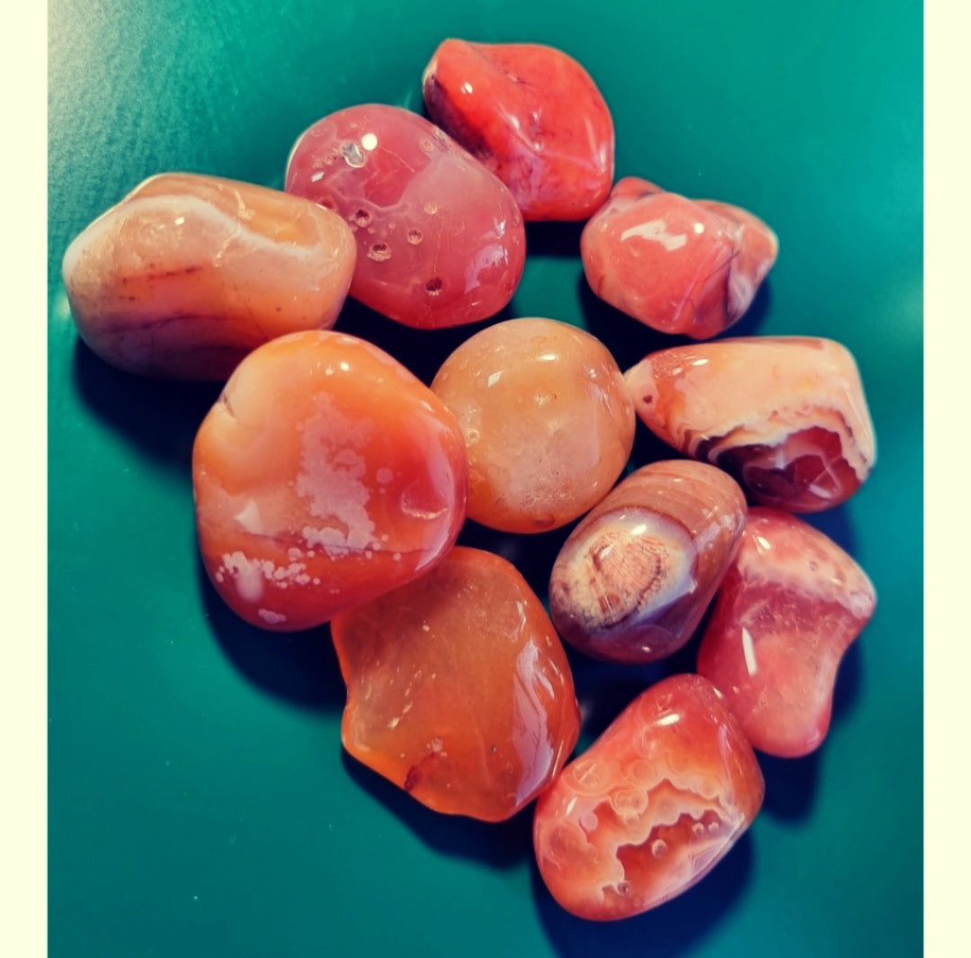 Photo of a number of carnelian India tumblestones.