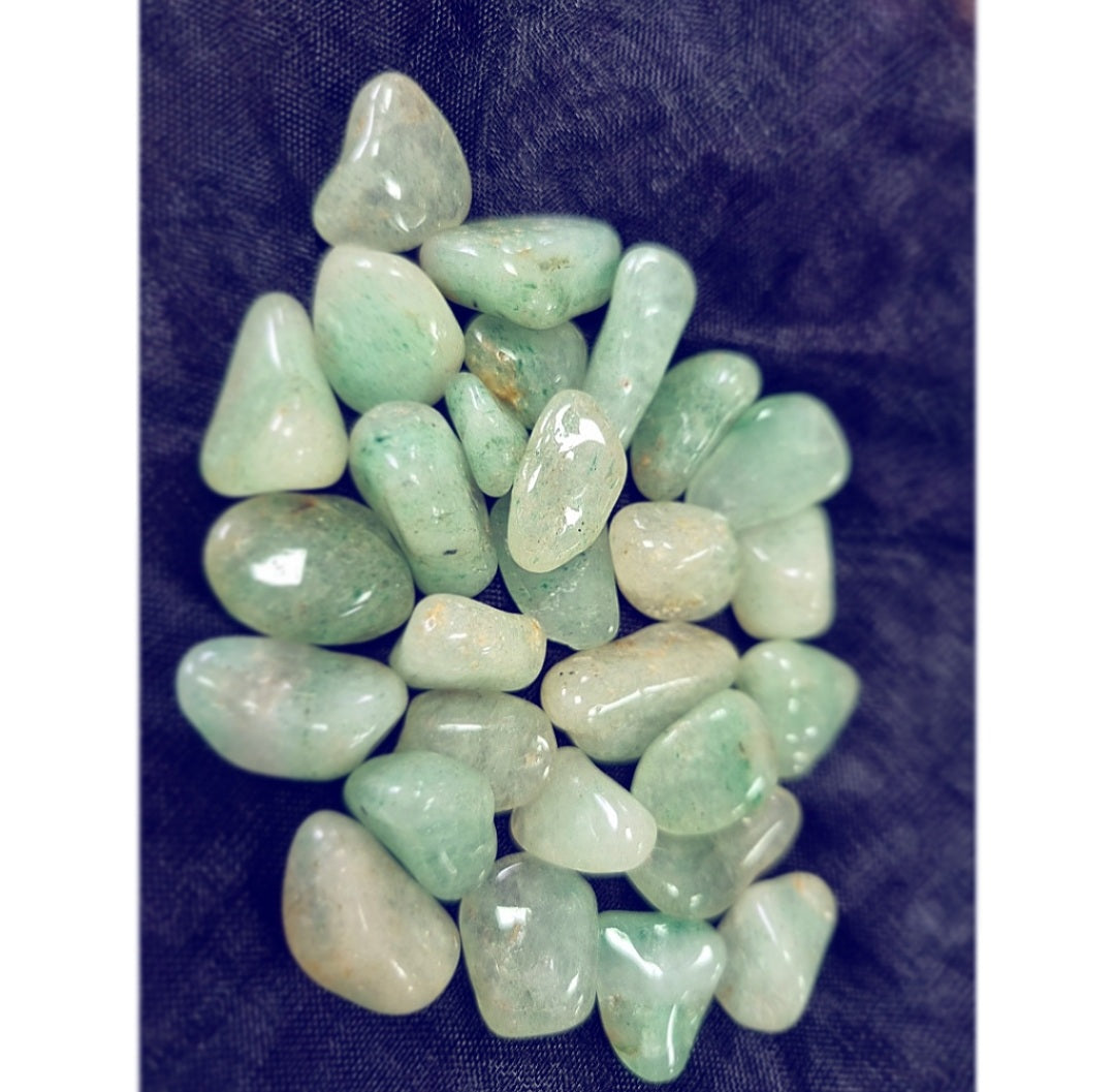 Photo of numerous small aventurine light tumblestones