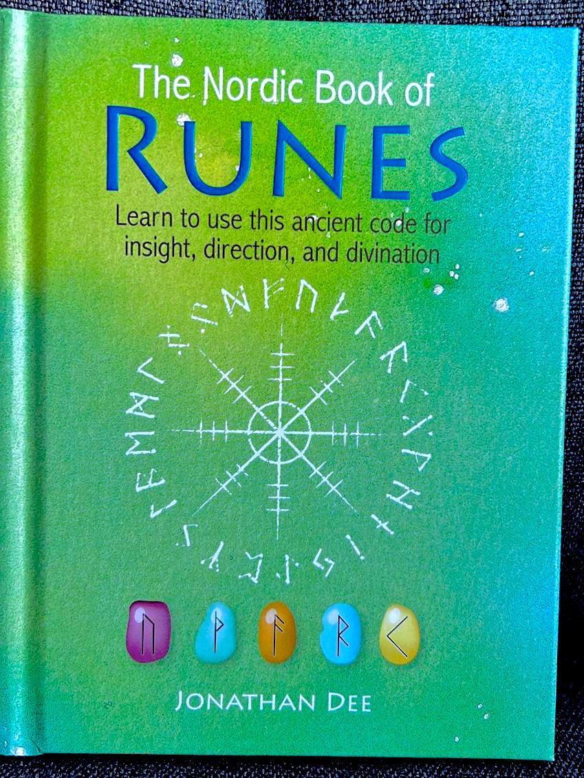 Photo of the front cover of the book The Nordic Book of Runes