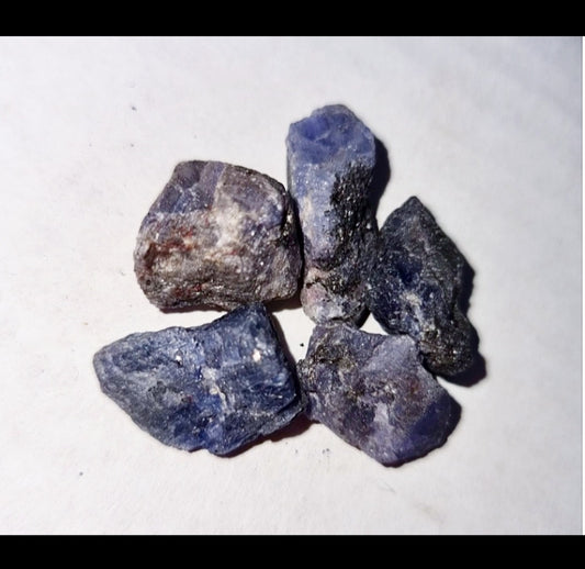 Photo of five pieces of tanzanite stone